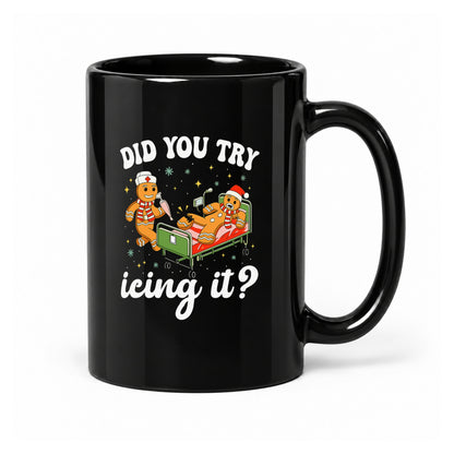 15-ounce glossy black ceramic mug with the complete Did You Try Icing It? gingerbread design, front view.