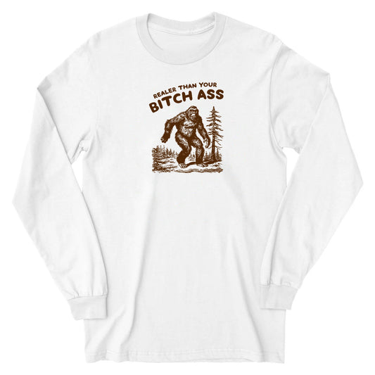 White cotton long sleeve with the original brown Realer Than Your Bitch Ass Bigfoot design, front view.
